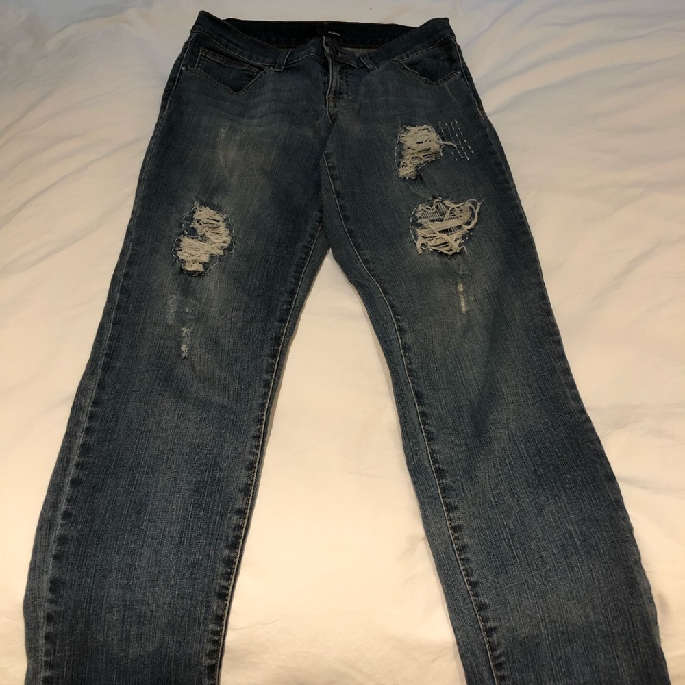 Distressed Aqua jeans in boyfriend style.